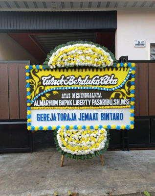 Papan Bunga Duka di Tegal S Mandala Iii
